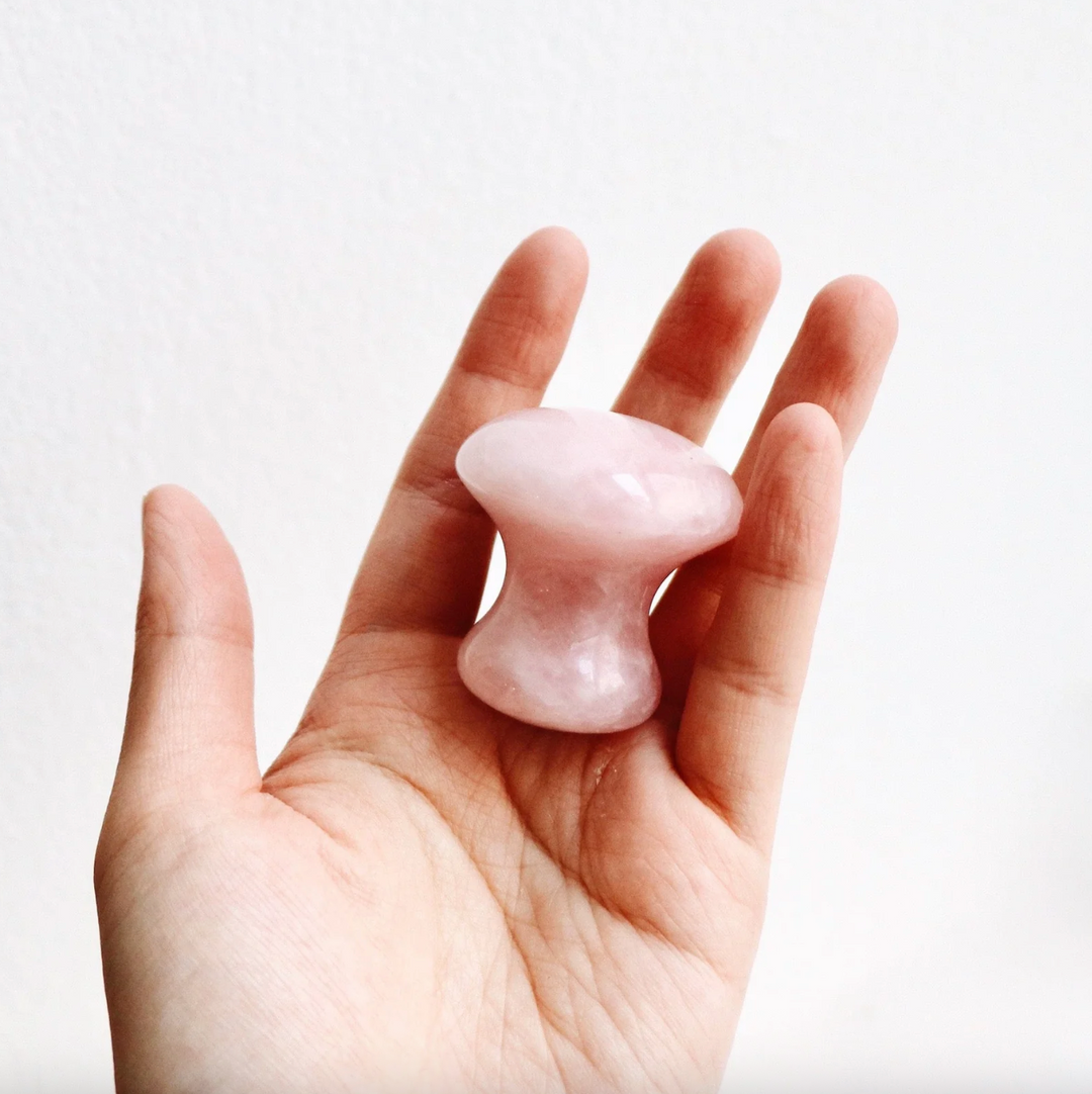 Outil de massage de quartz rose pour les yeux