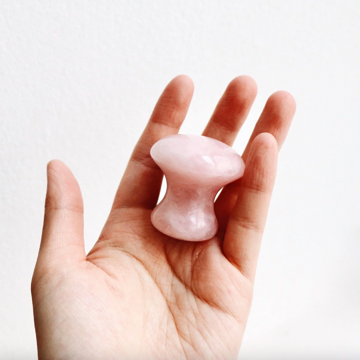 Outil de massage de quartz rose pour les yeux